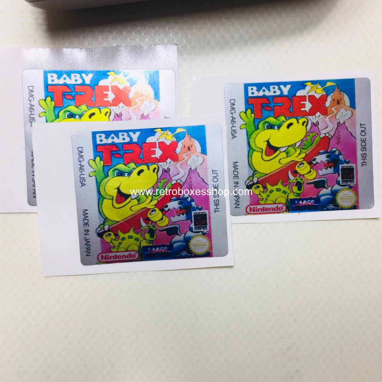 Baby T-Rex GameBoy Label - Metallic Silver Sides Replacement Sticker - Image 1